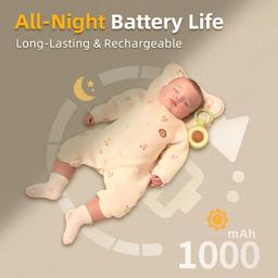Baby sleeping with sound machine nearby